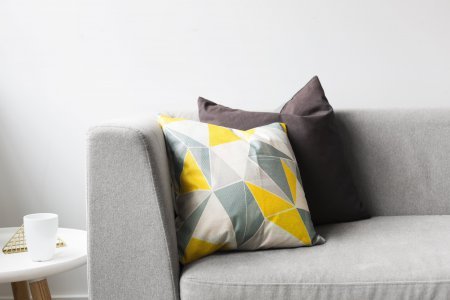 Modern grey couch and pillows